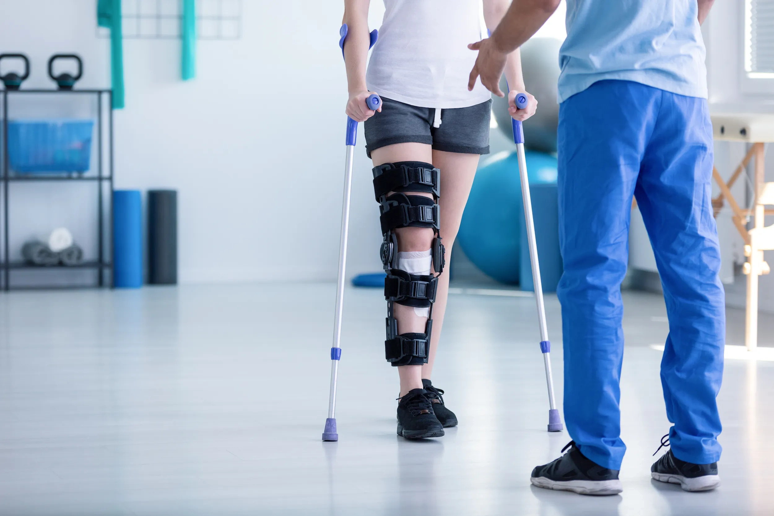 Patient receiving post-surgery knee rehabilitation at home